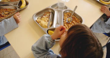 the children eat in the school canteen
