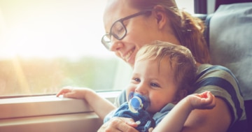 mother and child travel by train